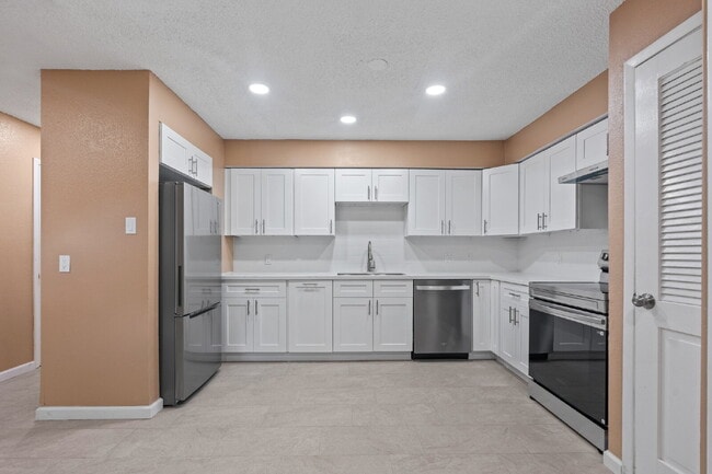 Photo - Furnished Option, Modern Comfort & Private Gated Patio!
