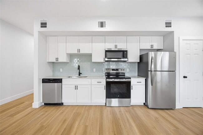 Building Photo - 7625 De Priest St Unit A