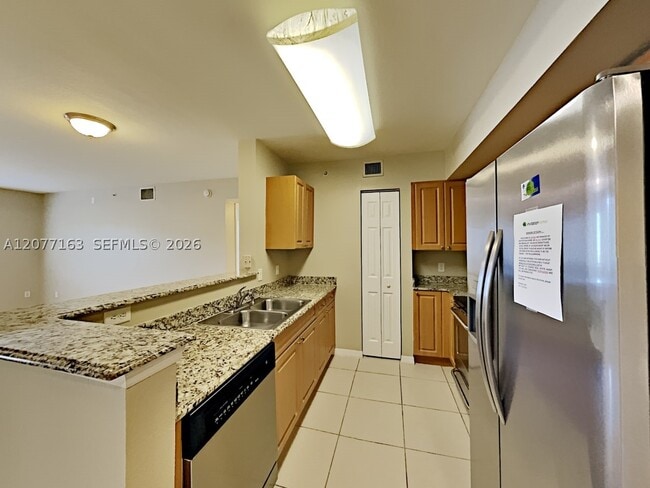 Building Photo - 6752 Heritage Grande Unit 5205