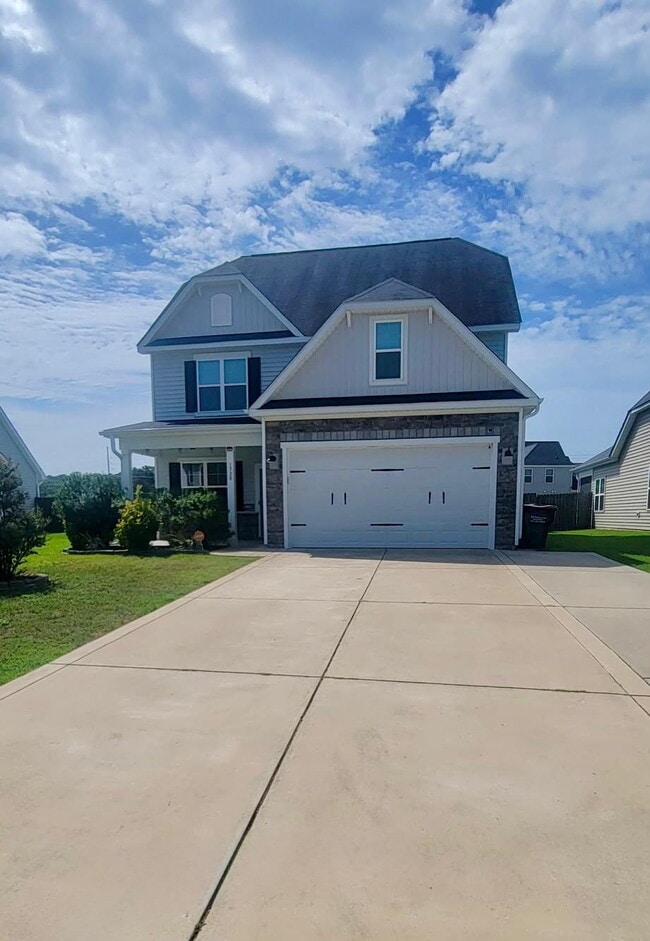 Building Photo - Spacious Elegance Awaits: 4-Bedroom Gem with Granite Countertops on Harrington Road!