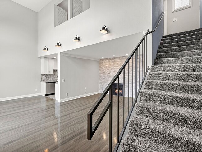 View of private stairs up to overhead loft.