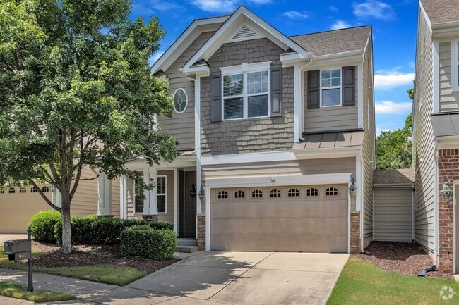 Building Photo - 3 Bedroom Townhome with 2 Car Garage in He...