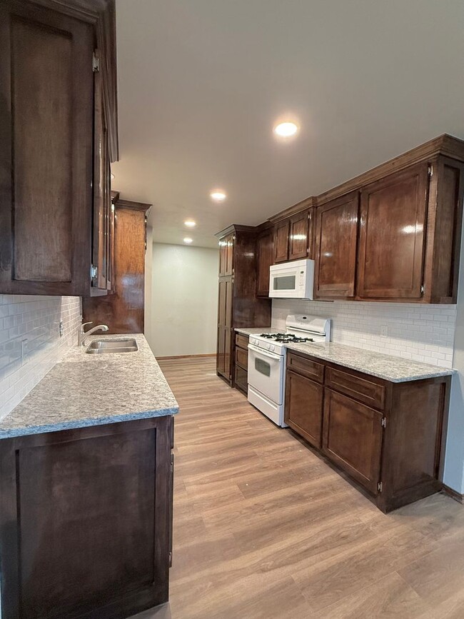Photo - Complete new remodel 3-2-2 home off Broadw...