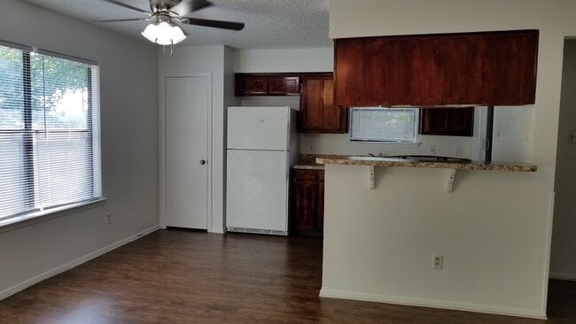 Kitchen with Breakfast Bar - 7632 John T White Rd