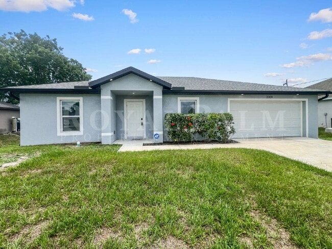 Photo - 4BR/2BA Home with High Ceilings, Garage & Large Kitchen Island