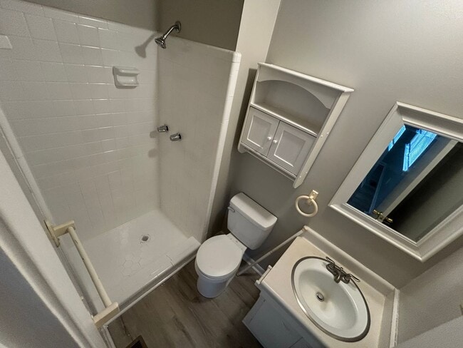 Photo - Charming 3BR Home with Fenced Backyard, Garage & Modern Flooring — 1,322 Sq Ft