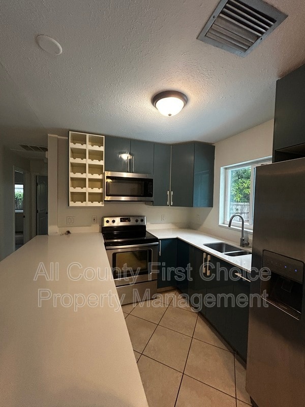 Photo - 9369 93rd Ave