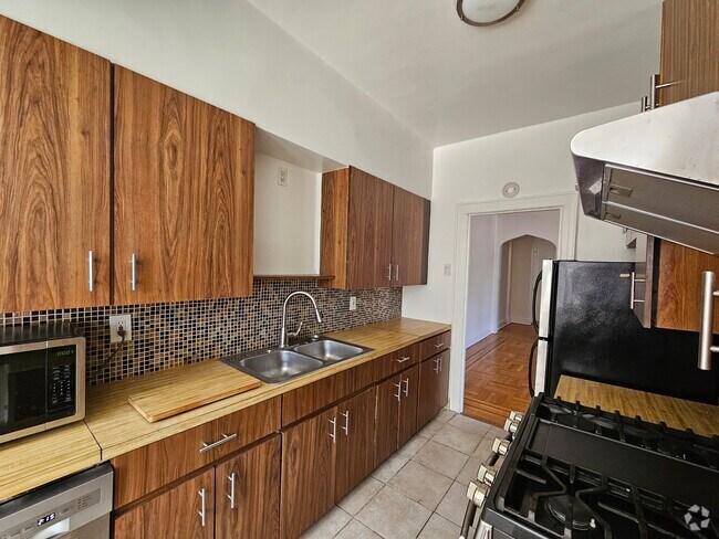 Building Photo - 8718 31st Ave Unit 2 BR/1 BA Rental