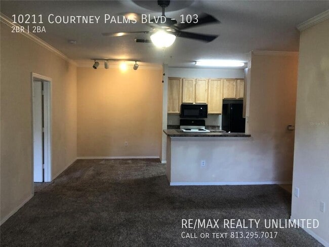 Photo - 10211 Courtney Palms Blvd Unit 103