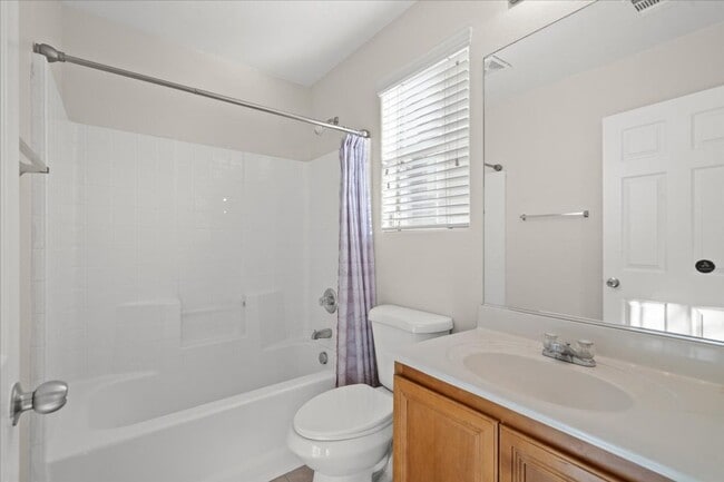 Photo - 3 Story, Spacious and Inviting 3-bedroom In Centennial Hills, with Downstairs Bedroom Suite