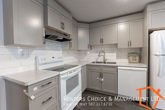 Photo - 2 bedroom Basement Suite, Assigned Parking, Insuite Laundry