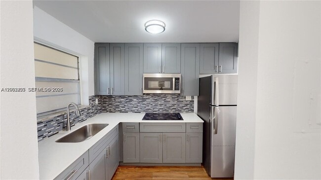 Building Photo - 453 SW 2nd St Unit 301C