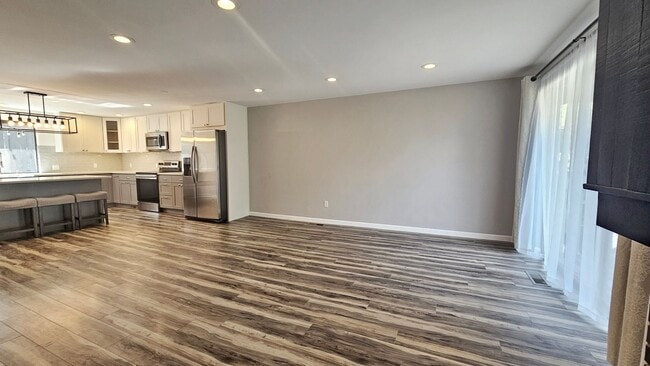 Photo - Modern Bellevue Townhome | Chef’s Kitchen, Dual Fireplaces & Private Patio