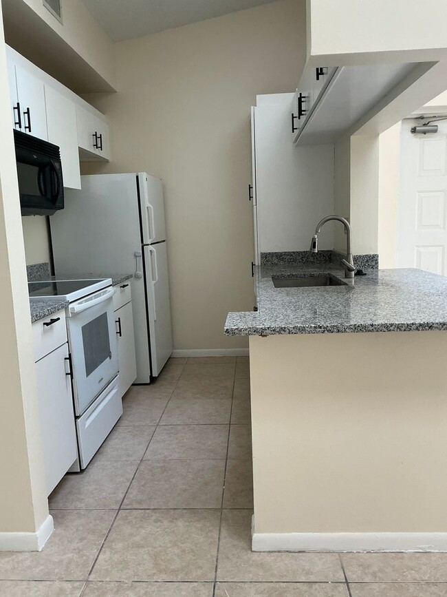 Photo - 2/2 CONDO IN THE DESIRABLE RIVERFRONT GATED COMMUNITY OF ANCHORAGE COVE.