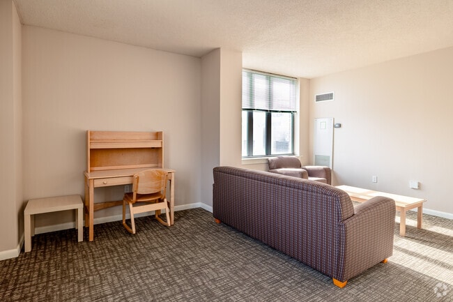 1BR, 1BA - 900SF - Living Room - 500 W Fayette St.