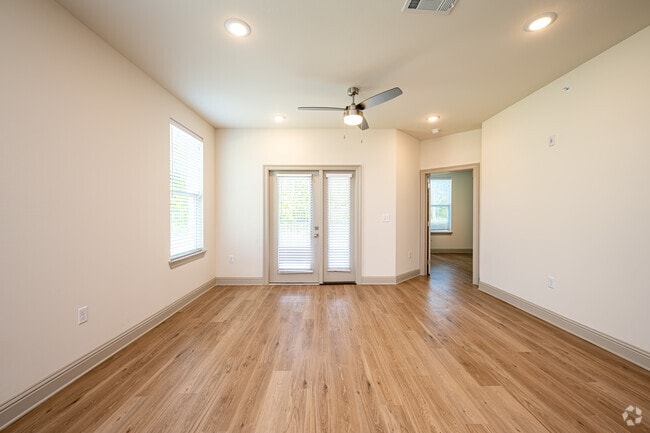 The Azelea: 1BR, 1BA- Living Room - The Waters at Settlers Trace