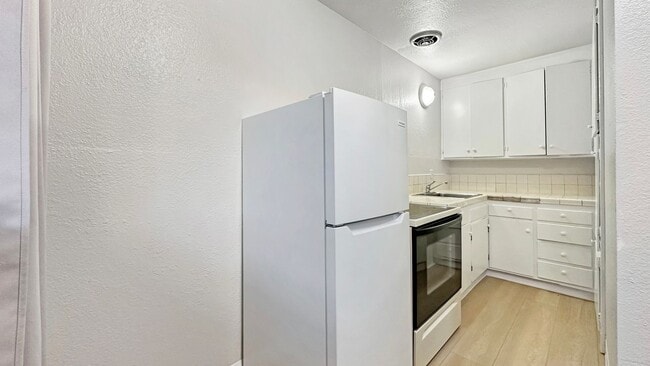 Photo - Cozy 1-bdrm, 1-bath in gated complex, includes 1 parking space, Located steps from schools and Hi... Unit 8