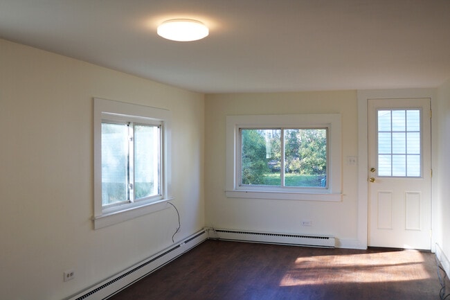 Open concept kitchen/living area with new flooring. - 34A Royal Ave Unit 34A Royal Ave