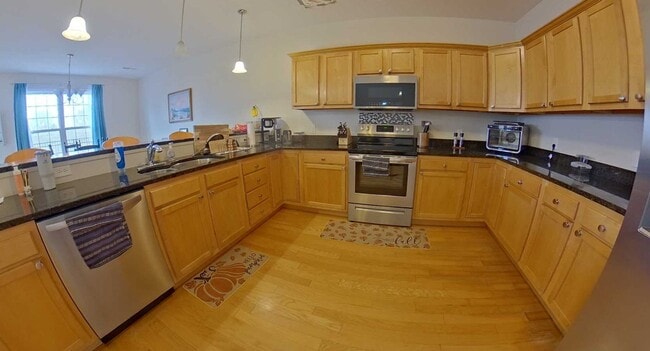 Photo - West Side + Fenced-in Yard + Attached 2-Car Garage + Washer & Dryer! Available June 19th!