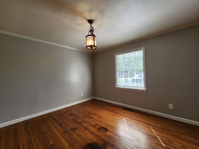 Photo - Charming 3BR/2BA Brick Home with Vintage Flair, Expansive Backyard & Walk to VSU!