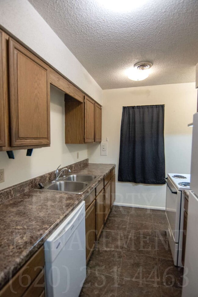 Photo - Charming 2-Bedroom Oasis in the Heart of Coffeyville Unit Apartment E