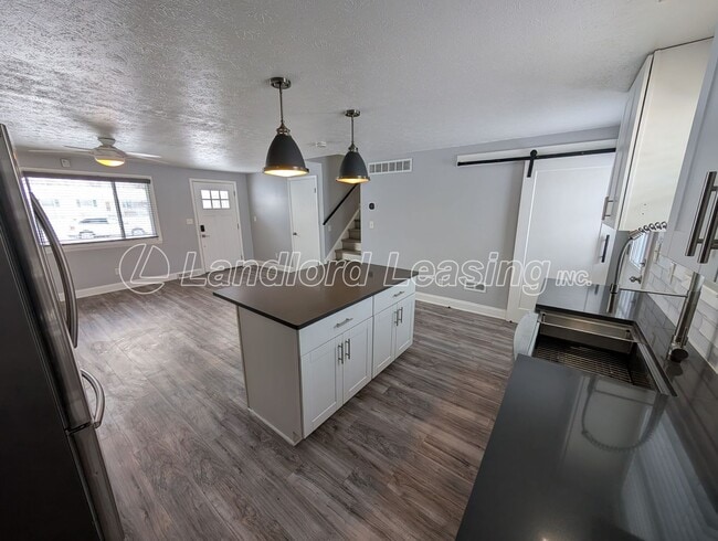 Photo - Updated 3-Bedroom Split-Level with Open Kitchen & Finished Lower Level