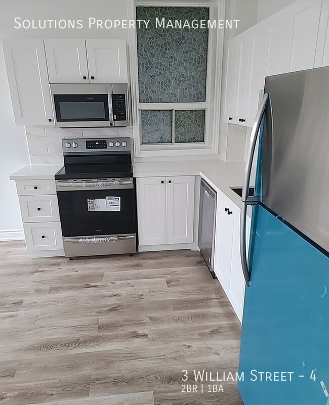 Building Photo - Stunning Two Bedroom Unit 4