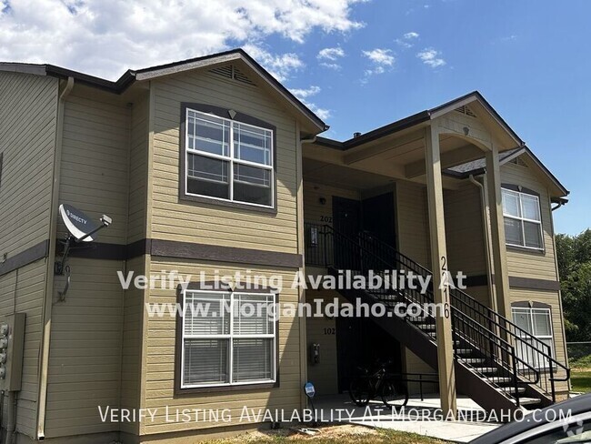 Building Photo - Upstairs with covered parking, large bath,... Unit 201 Rental