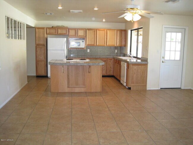 Photo - “Spacious 4-bedroom home with private pool in prime Tempe location!”