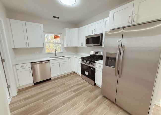 Building Photo - 5216 Duke Ave Unit Up