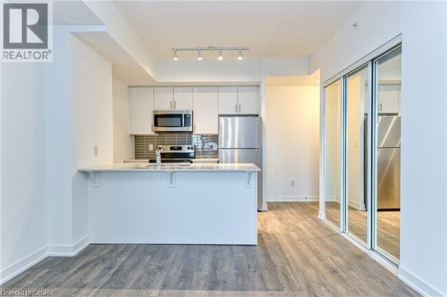 Photo - 550 N Service Rd Unité 602