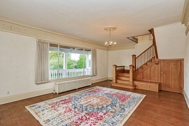 Photo - Historic North Slope Charm with Sweeping Sound Views — 4BR/1.5BA Unit A