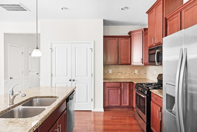 Photo - Well Maintained End Unit Townhome with Community Pool! Available July 14th!