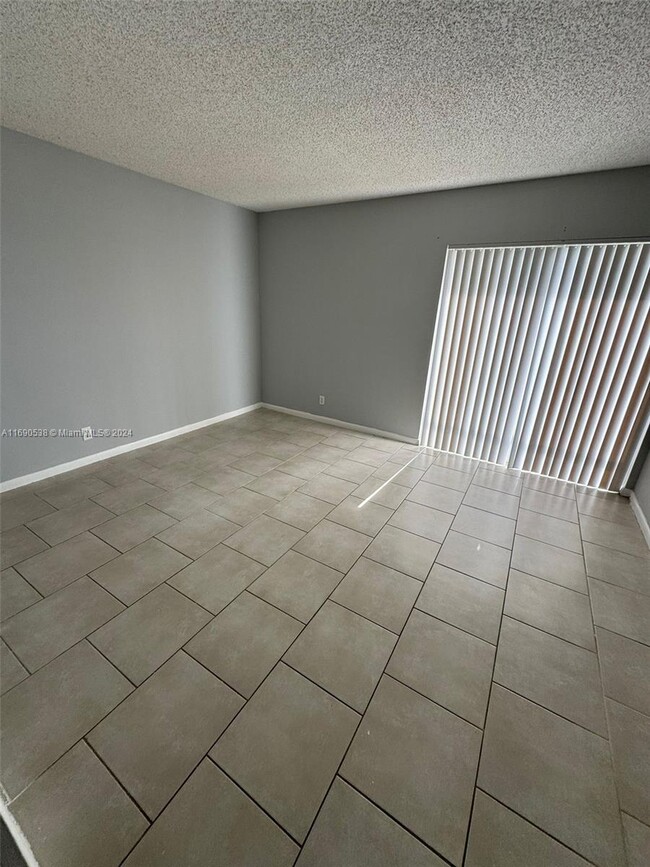 Building Photo - 8560 N Sherman Cir Unit 403 Rental