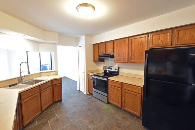 Photo - Shelby Township-2 Bedroom Duplex with Basement, Deck & Attached Garage