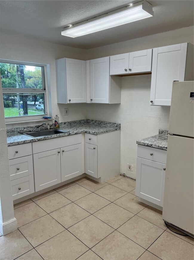 Building Photo - 5900 NW 1st Ave Unit 3