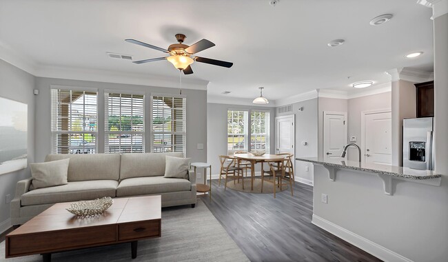 Select floorplans have kitchen islands, perfect for bar top seating - Olde Towne Residences Apartments