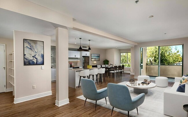Daylight reaches from the patio doors all the way back to the entry.