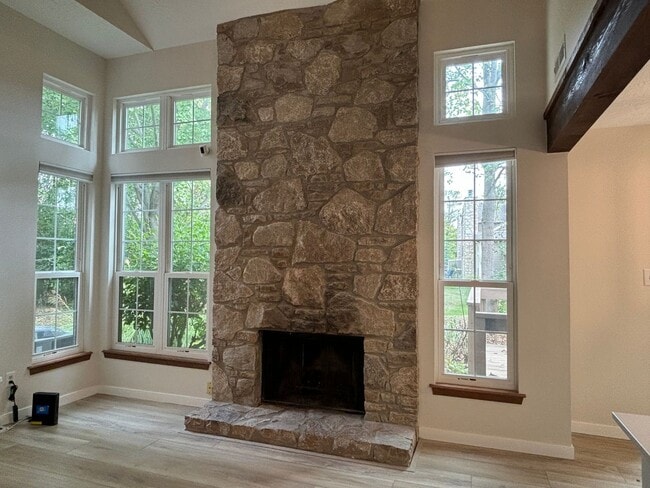 Building Photo - Charming Condo in a Can't-Miss Location – Private Deck, Garage, and Nature-Filled Community