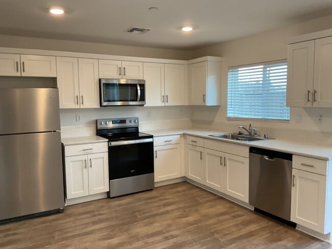 Photo - "Charming 3-Bed, 3-Bath Home right on the golf course - 1370 Sq Ft of Cozy Living!"