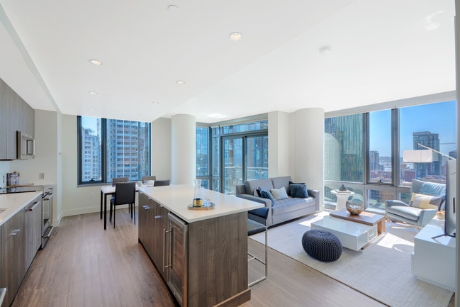 Floor-to-ceiling windows and balconies in select apartment homes - Stratus Apartments