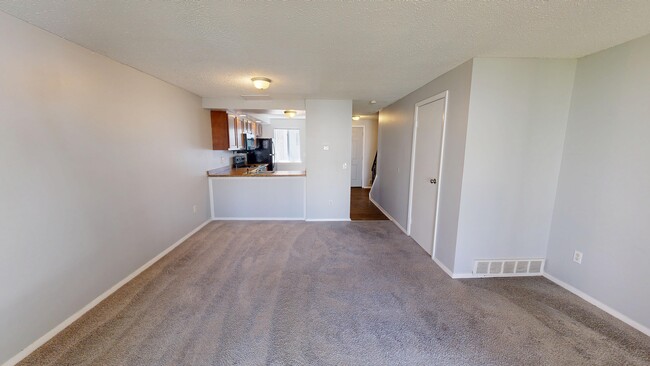 2BR, 1.5BA - 1,100SF - Living Room/Dining Area