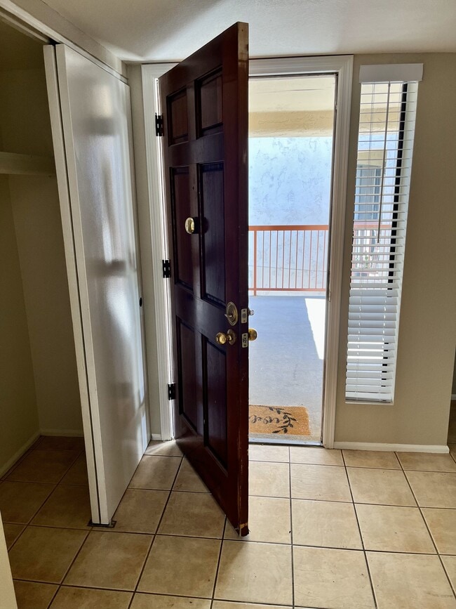 front door - 9355 N 91st St Condo Unit 214