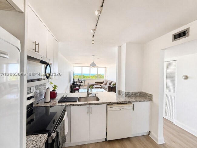 Photo - 8233 Harding Ave Unit 703