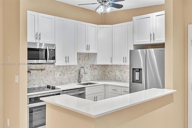 Building Photo - 9487 W McNab Rd Unit 205