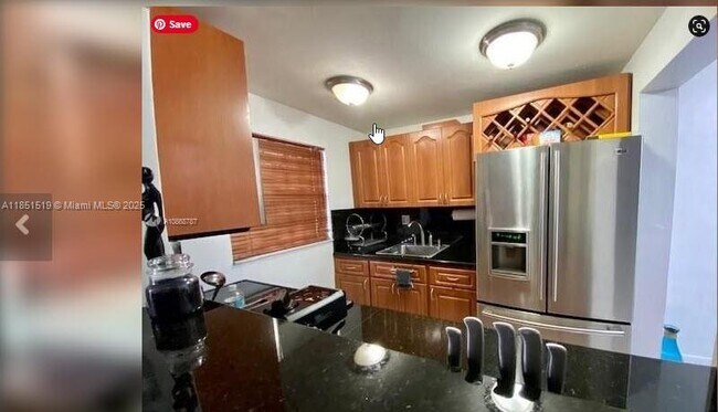 Photo - 1325 W 68th St Unit 413