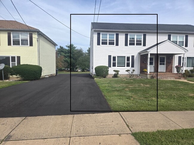 Photo - Updates abound at this SPACIOUS, half dupl...