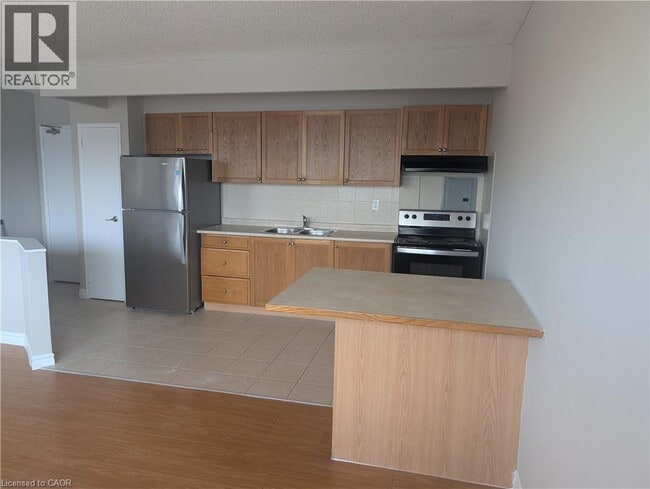 Photo - 468 Ottawa St N Unité 123 B