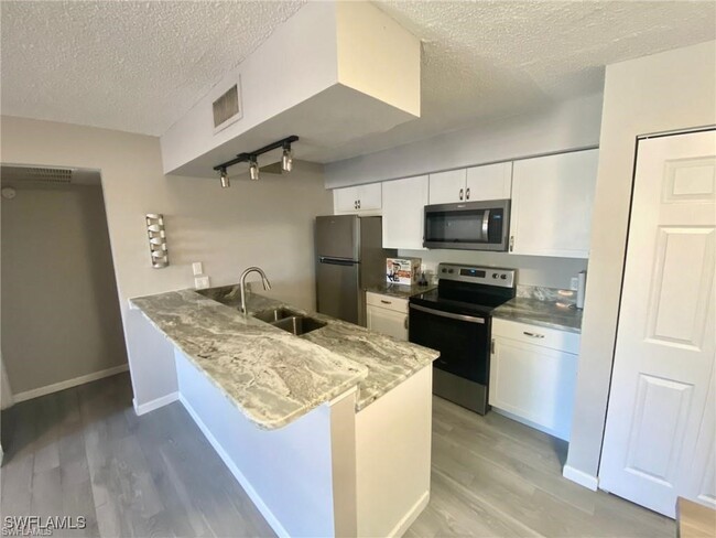 Photo - 5321 Summerlin Rd Condo Unit #12