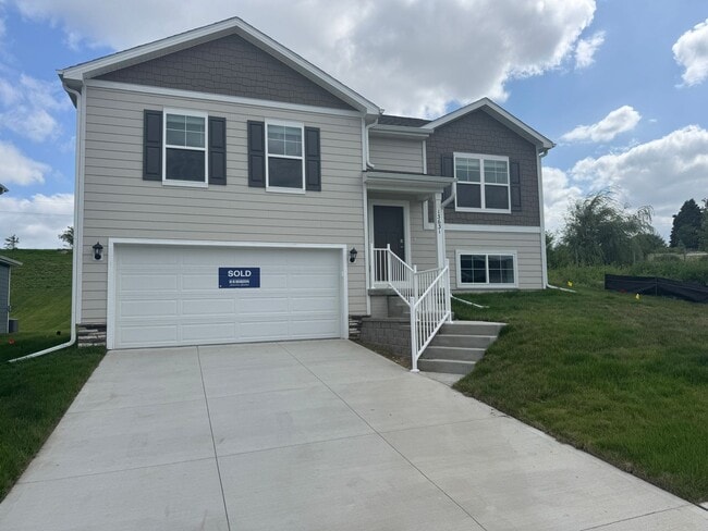 Building Photo - Spacious 4-Bedroom Split-Level Near Standing Bear Lake & Trails